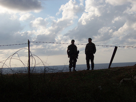 Lebanese Army Standing Next To The Border