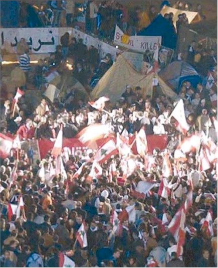 Tens of thousands of protesters gather in Beiruts Martyrs Square.
