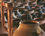 El Massaya Filling the arak jars