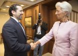 International Monetary Fund Christine Lagarde (R) greets Saad Hariri, Prime Minister of Lebanon